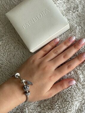 Pandora charm bangle bracelet sterling silver (inc. 4 charms)